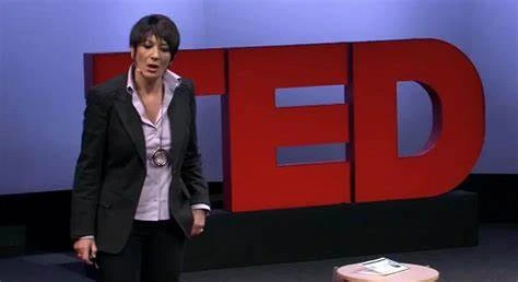 Guislaine Maxwell leads a TED talk.