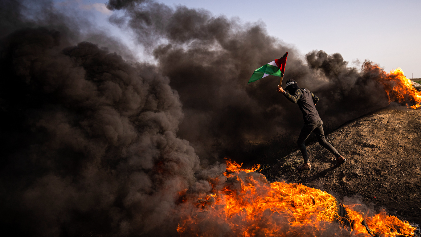 Palestinian Flag Amongst the Fire