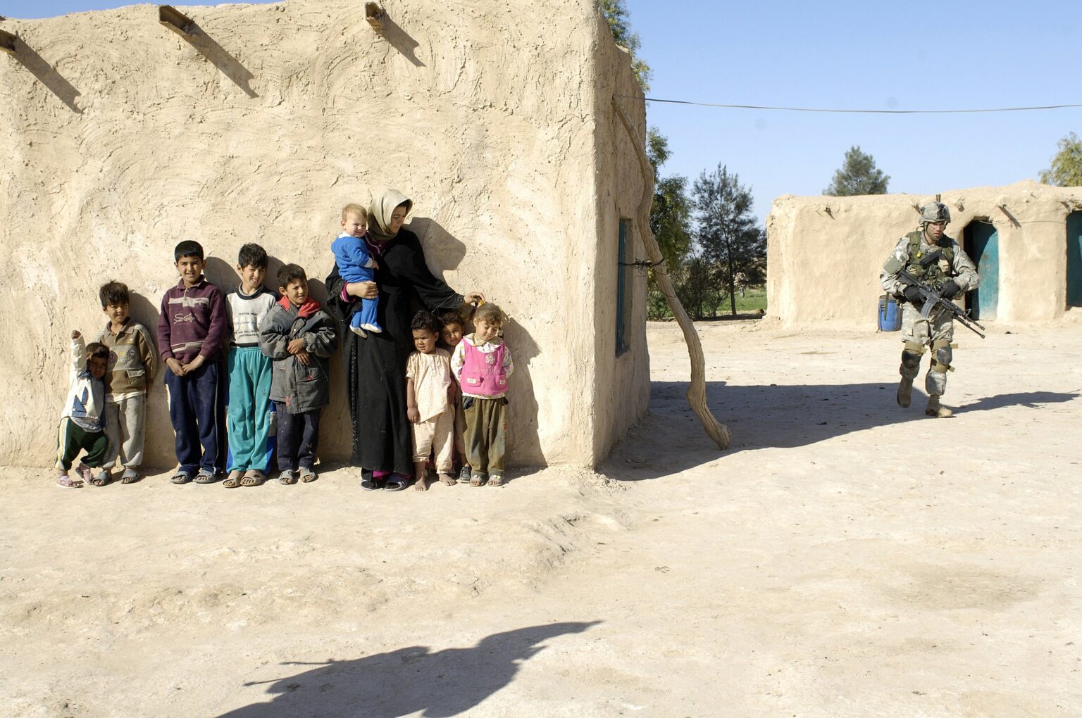 Soldier conducts house search in Iraq