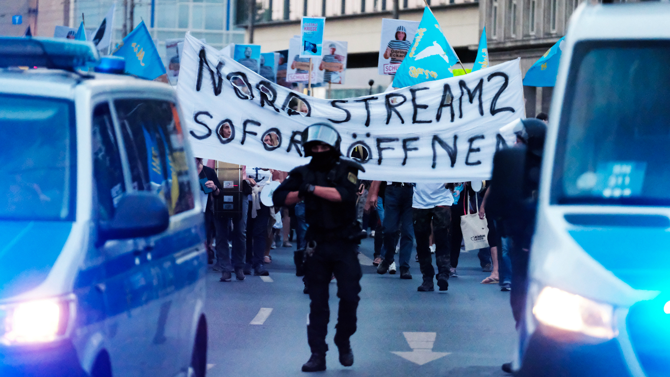 Police at a protest to reopen NordStream