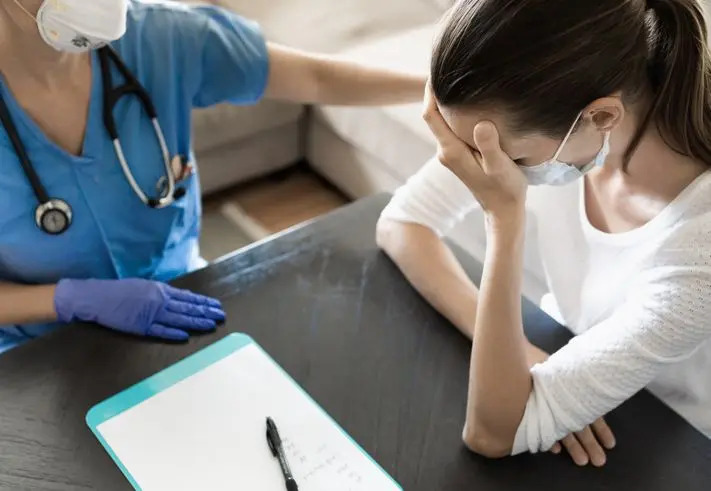 Nurse comforts a patient